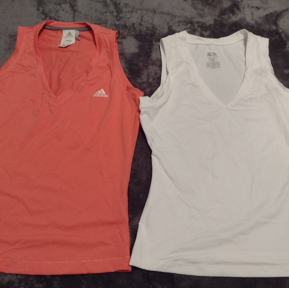 1 Adidas small sleeveless shirt and 1 Athletic Works small sleeveless shirt